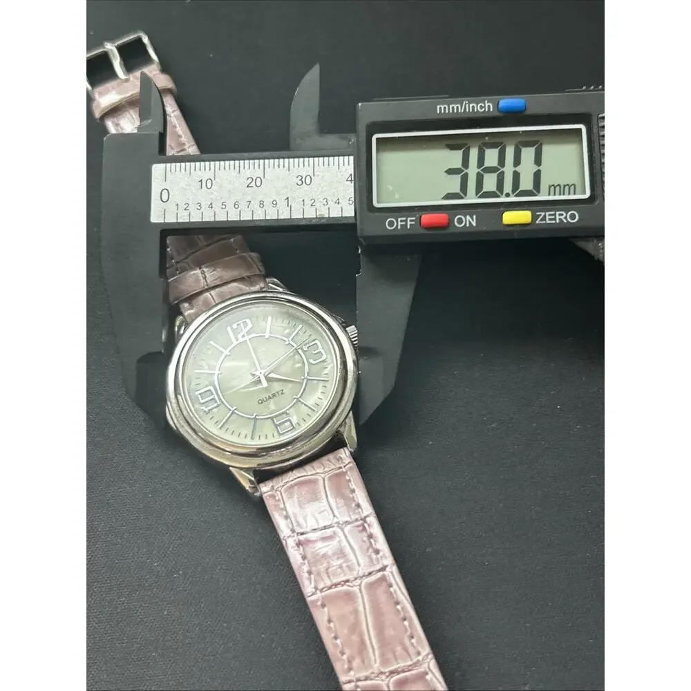 Silver Tone Pearlized Dial Purple Band Women’s Quartz Watch